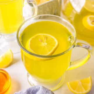 lemon ginger turmeric tea in a mug.