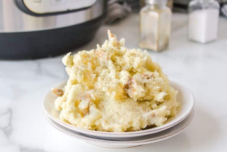 instant pot mashed potatoes served on plate.