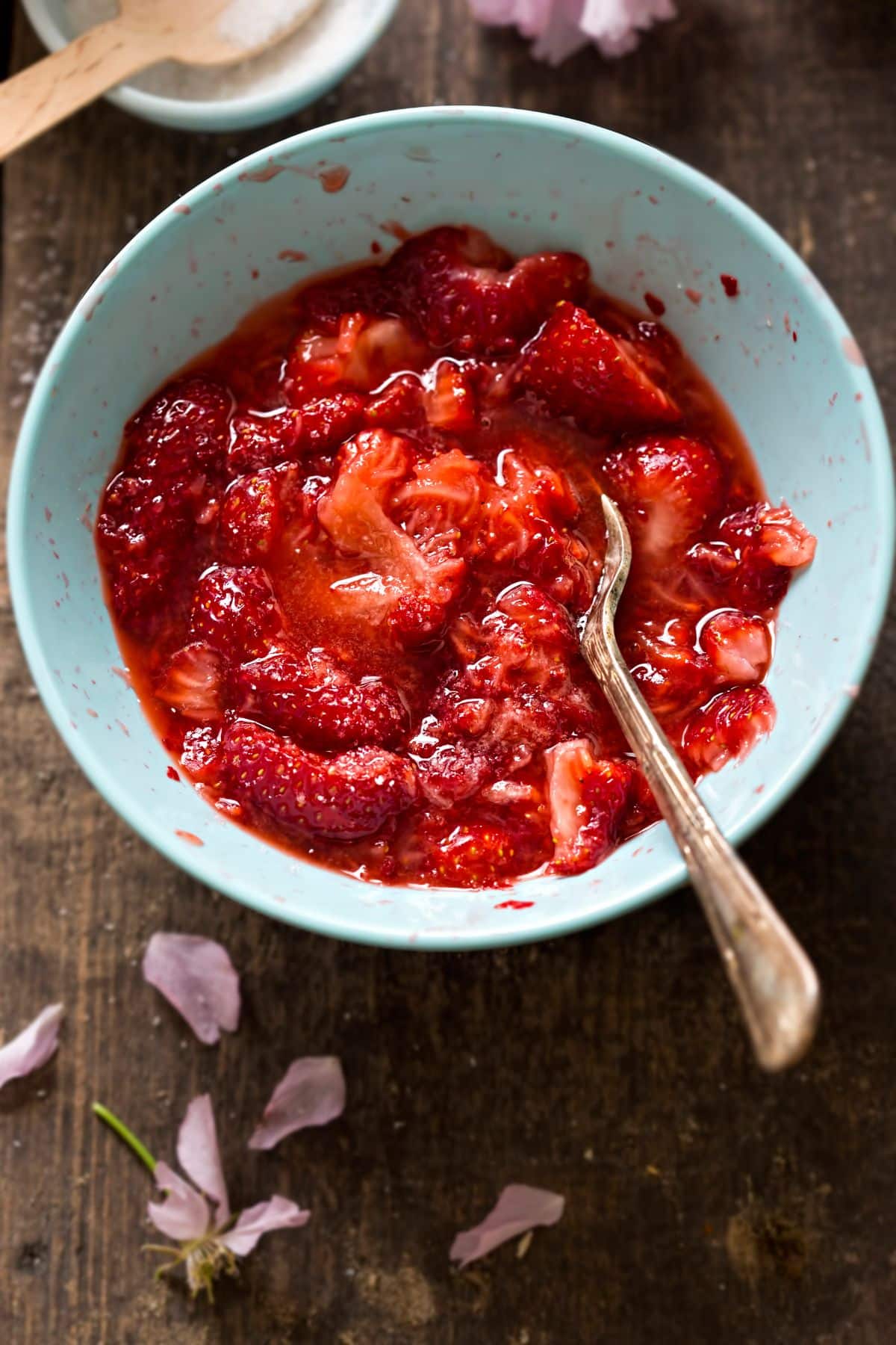 mashed strawberries in bowl.