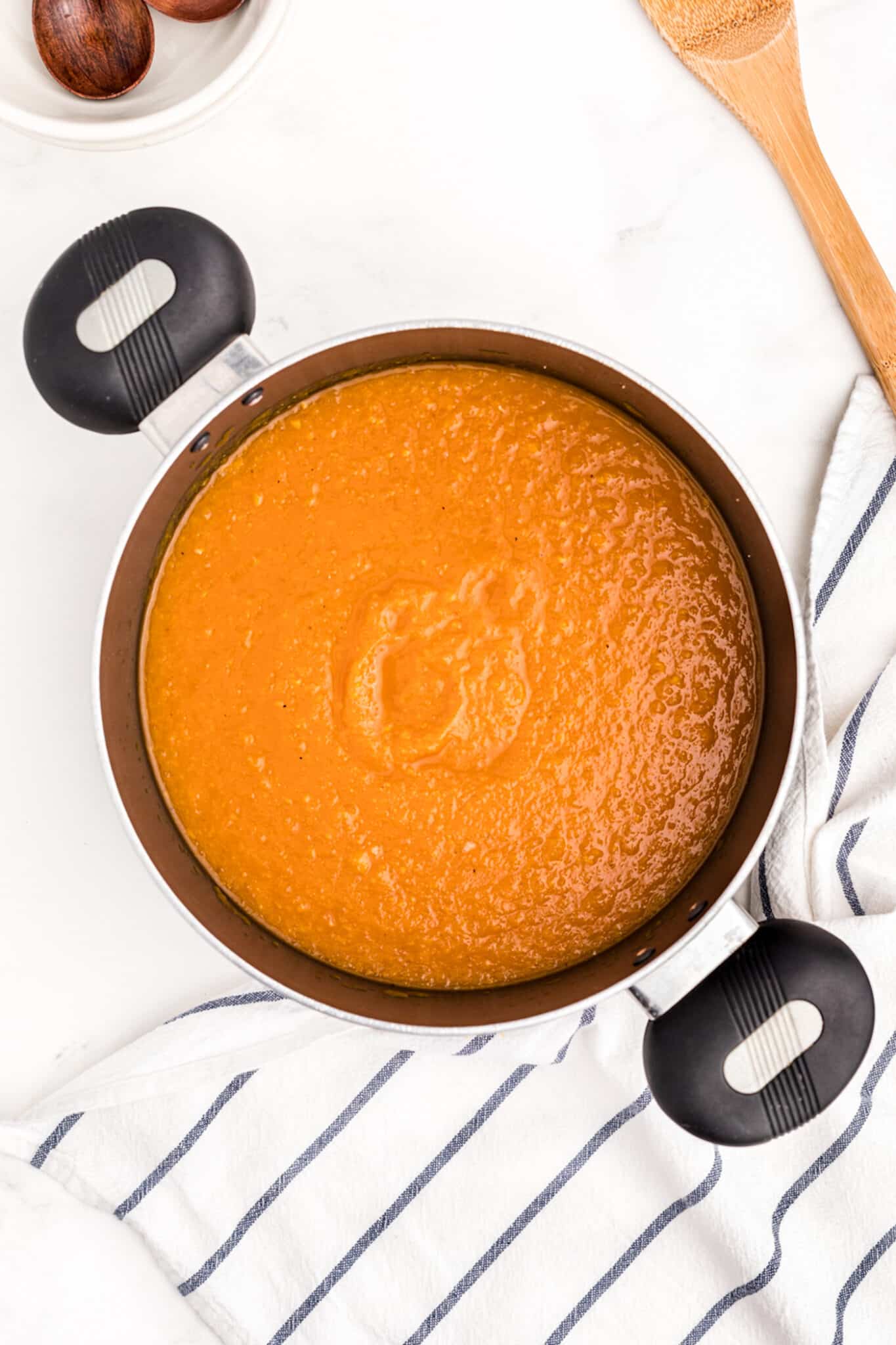 pureed butternut squash soup in pot.