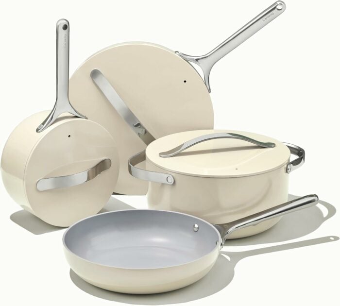 ceramic cookware set from caraway in cream color.