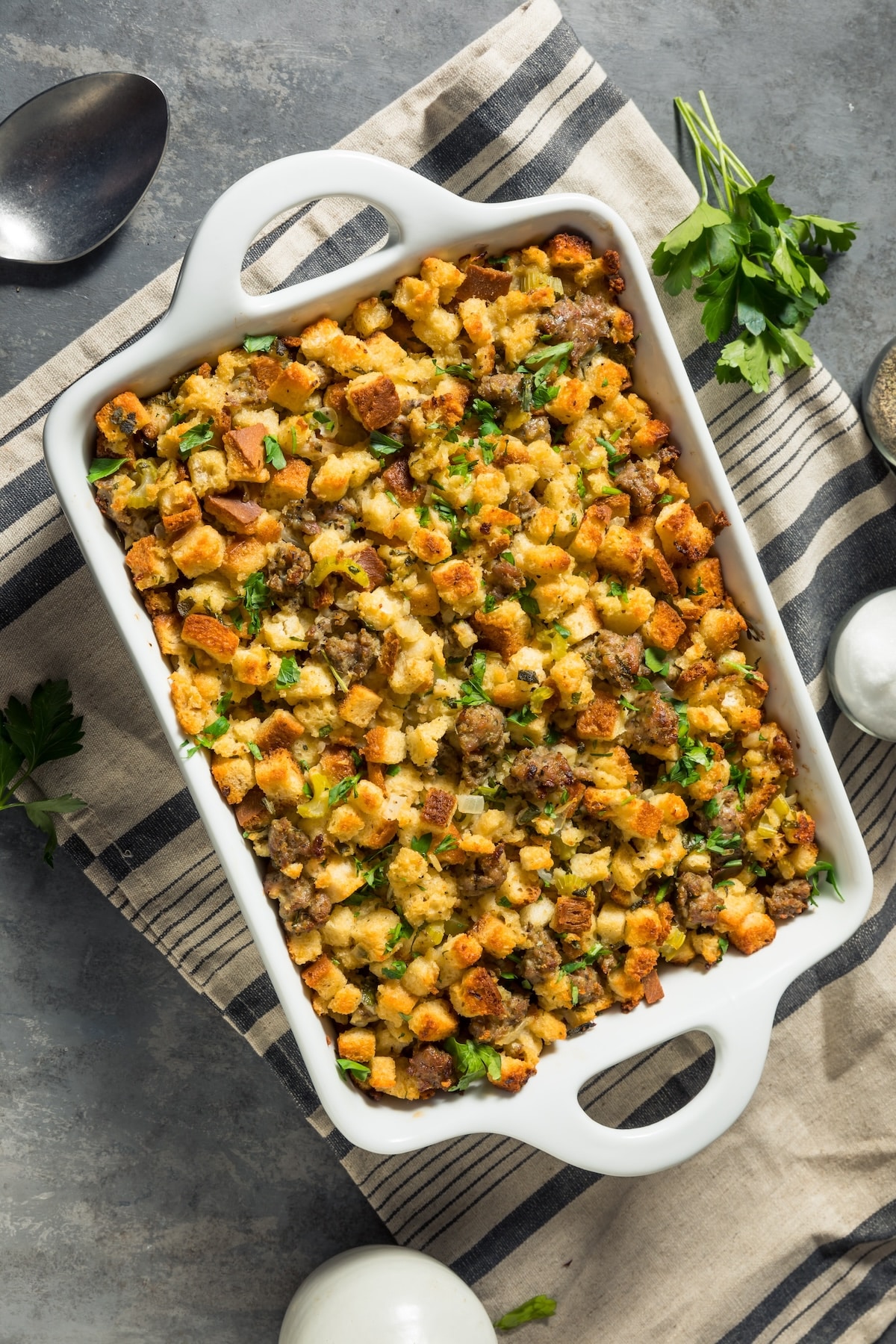 instant pot stuffing with sausage in white serving tray.