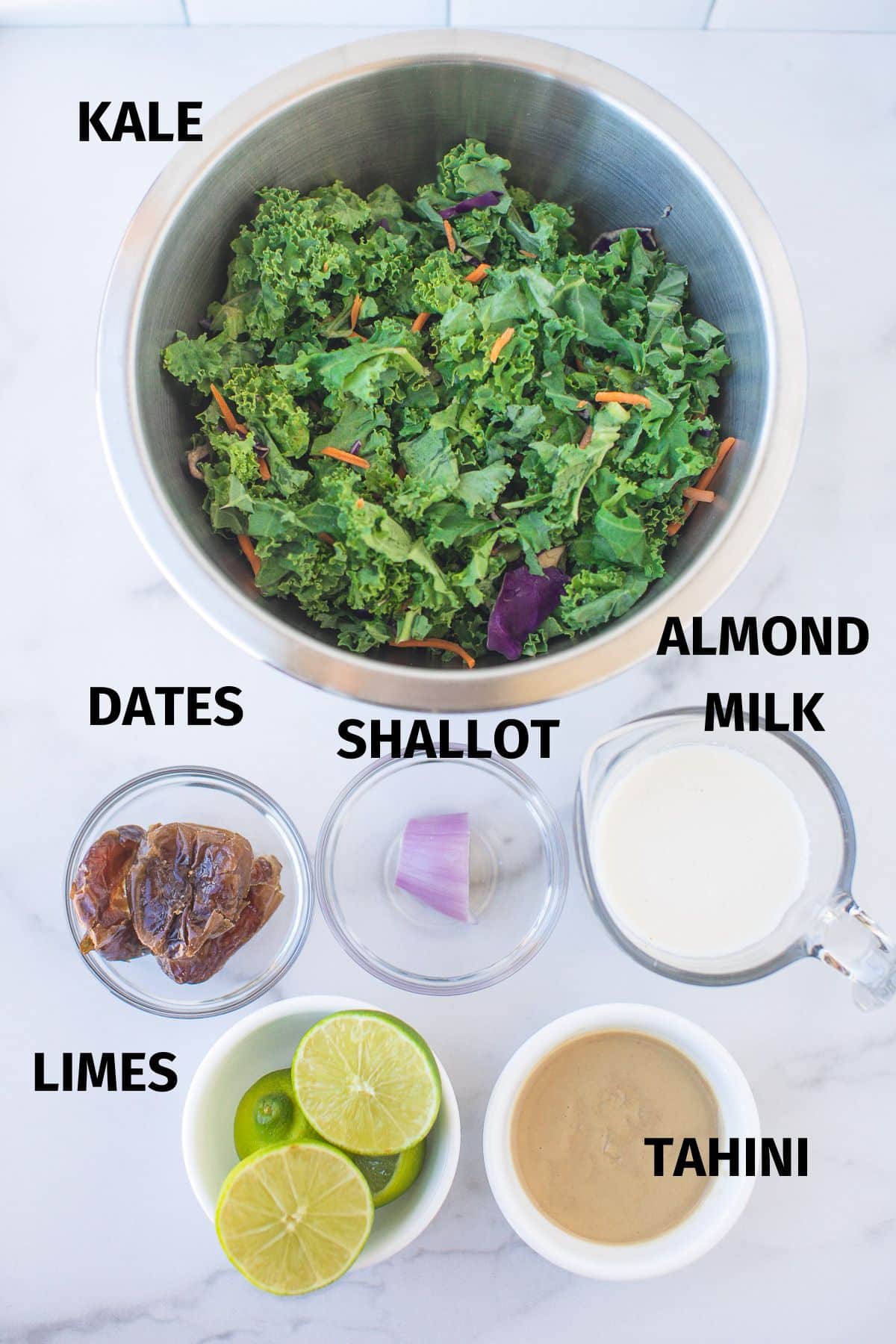 ingredients for creamy vegan kale salad with labels.
