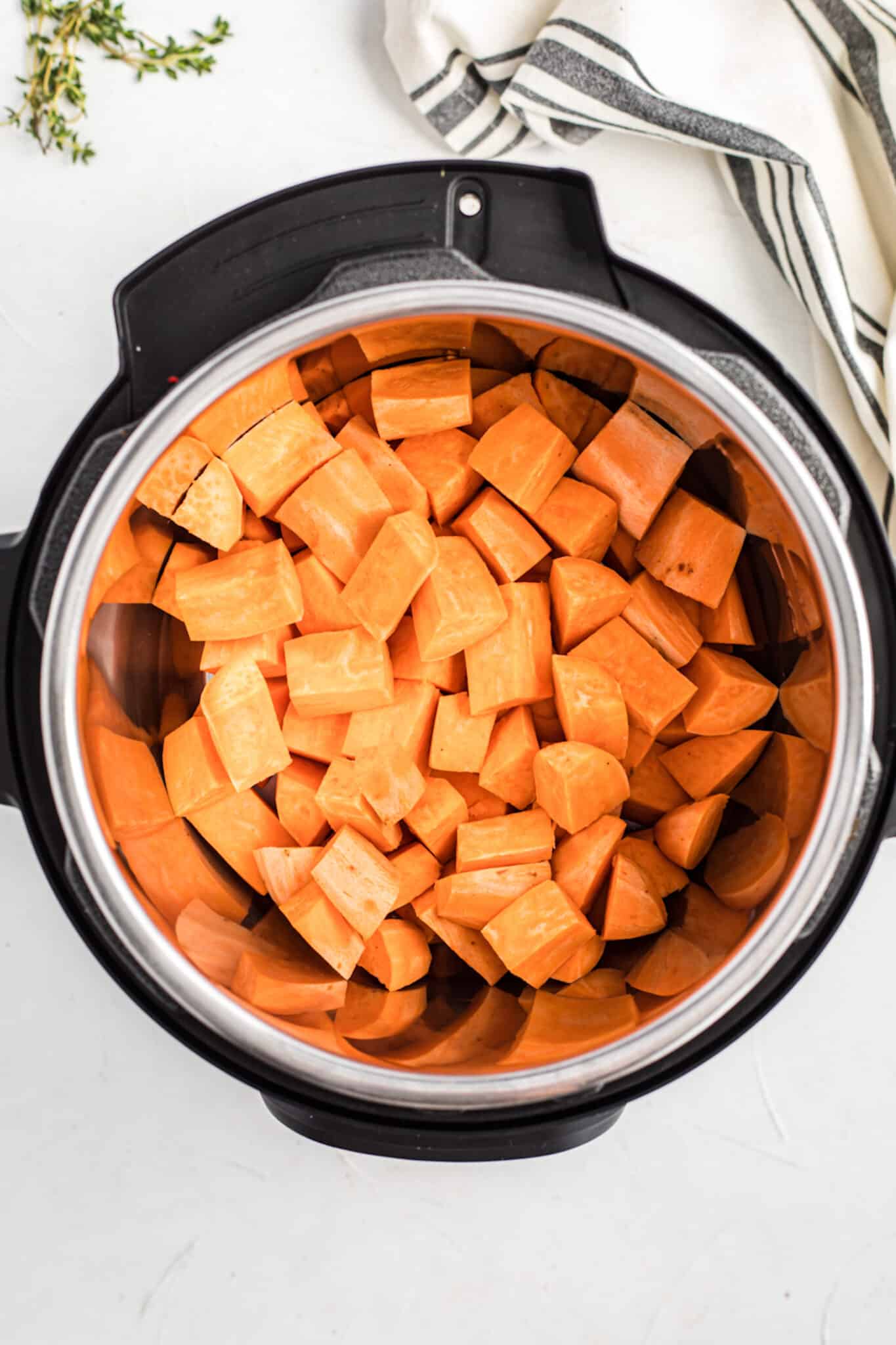 chopped sweet potatoes in instant pot.