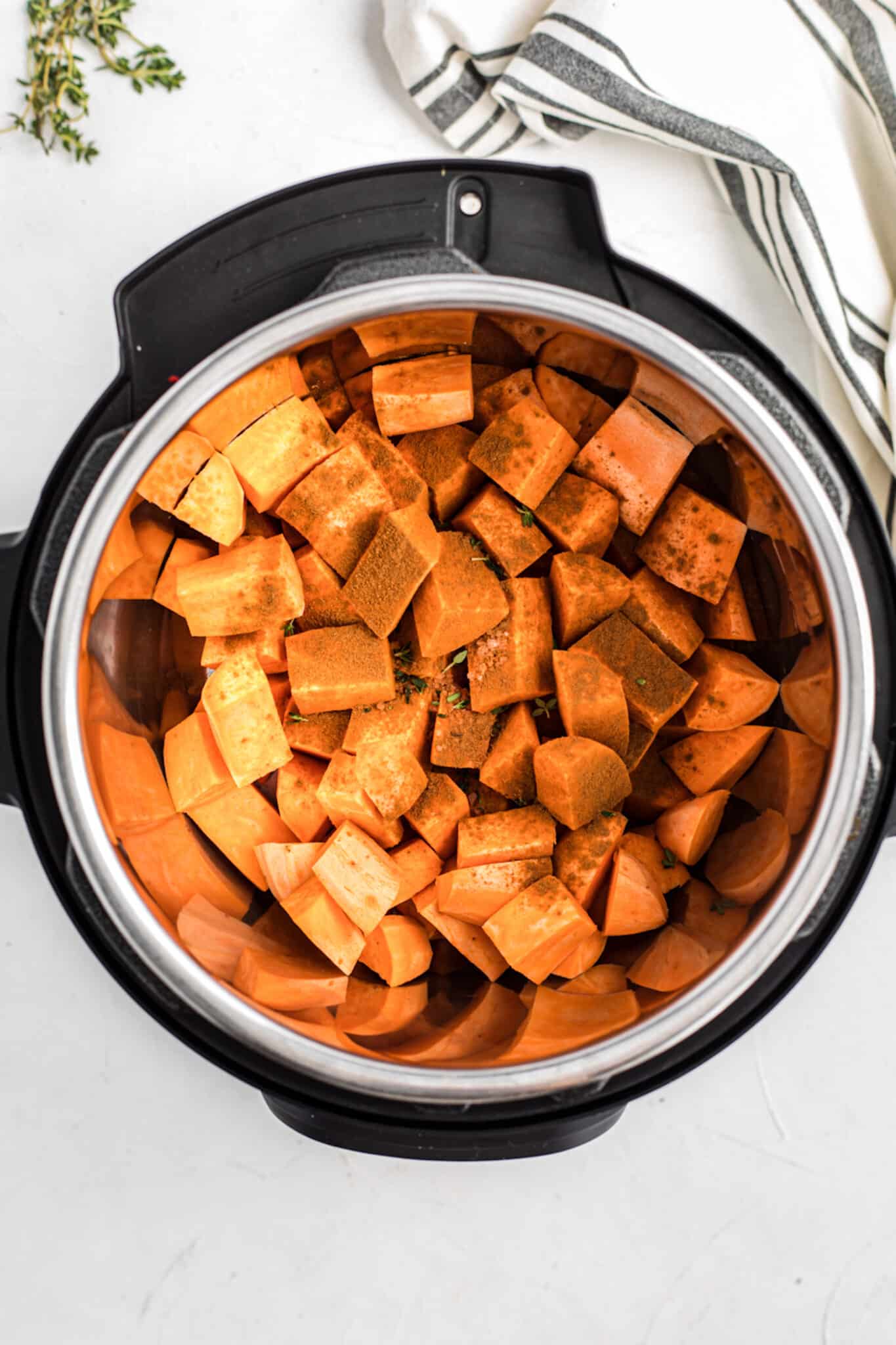 ingredients in instant pot for making mashed sweet potatoes.