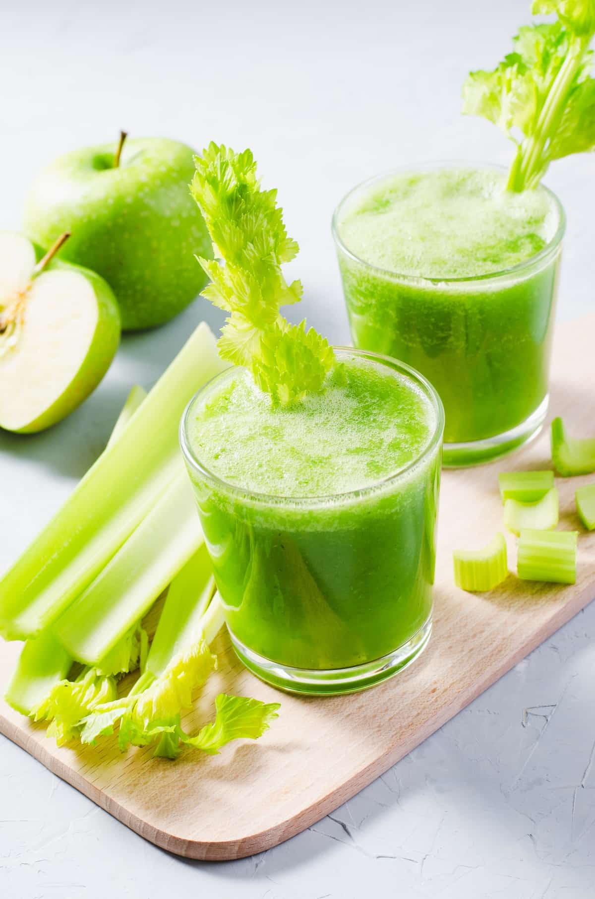 two glasses of celery apple juice.