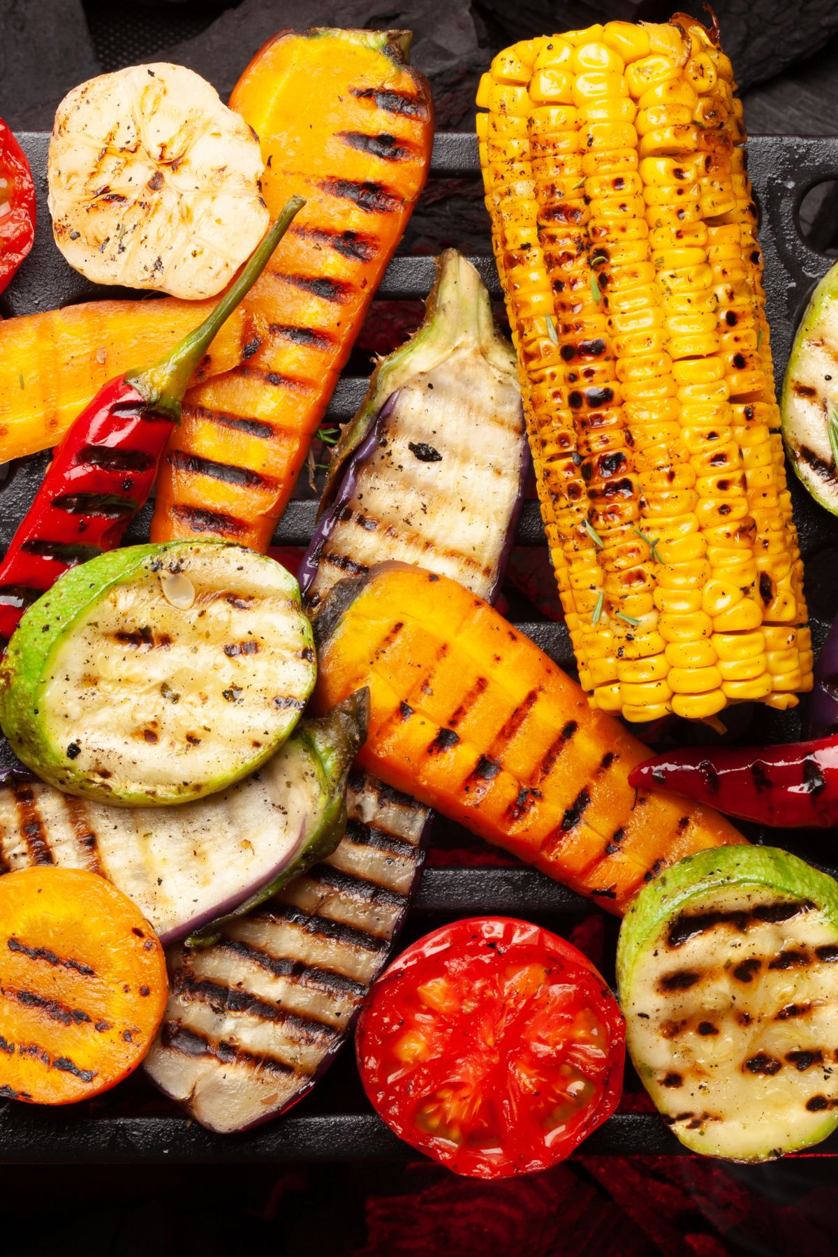 vegetables cooking on a grill.