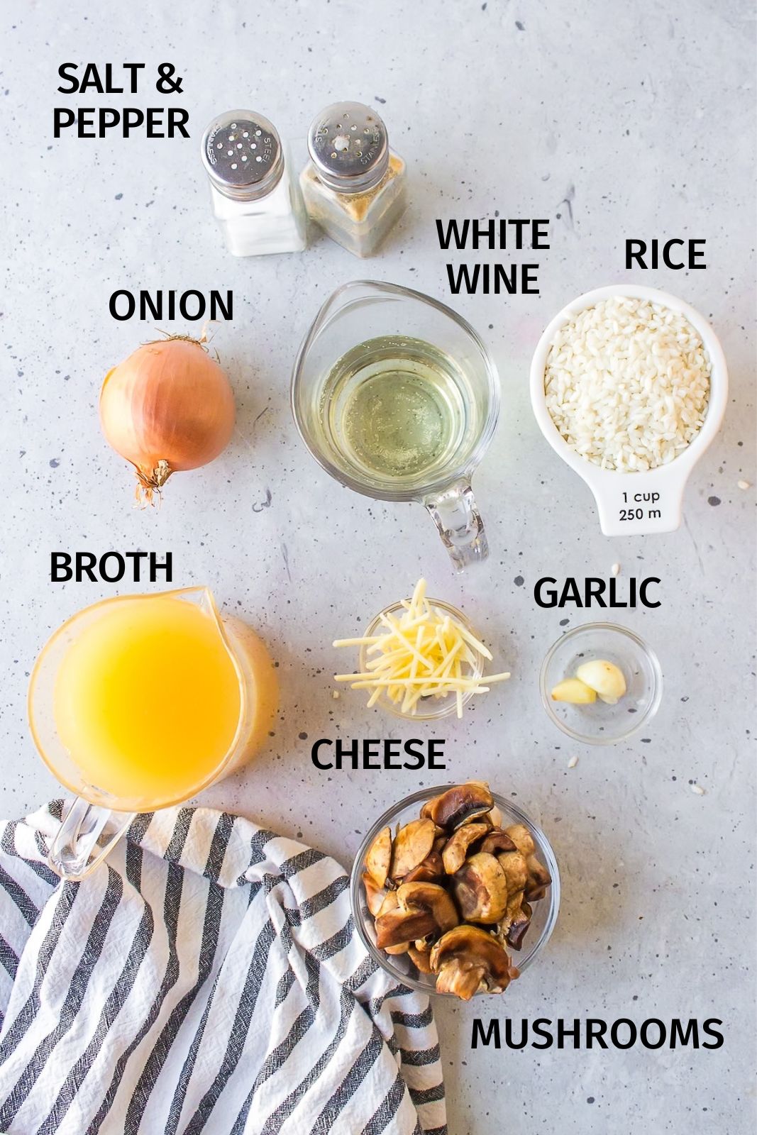 ingredients for gluten-free risotto on a white counter.