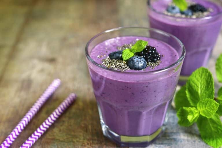 two glasses of blackberry chia smoothie.
