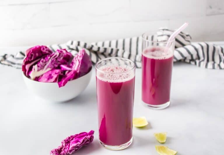 glass of purple cabbage juice in a glass.