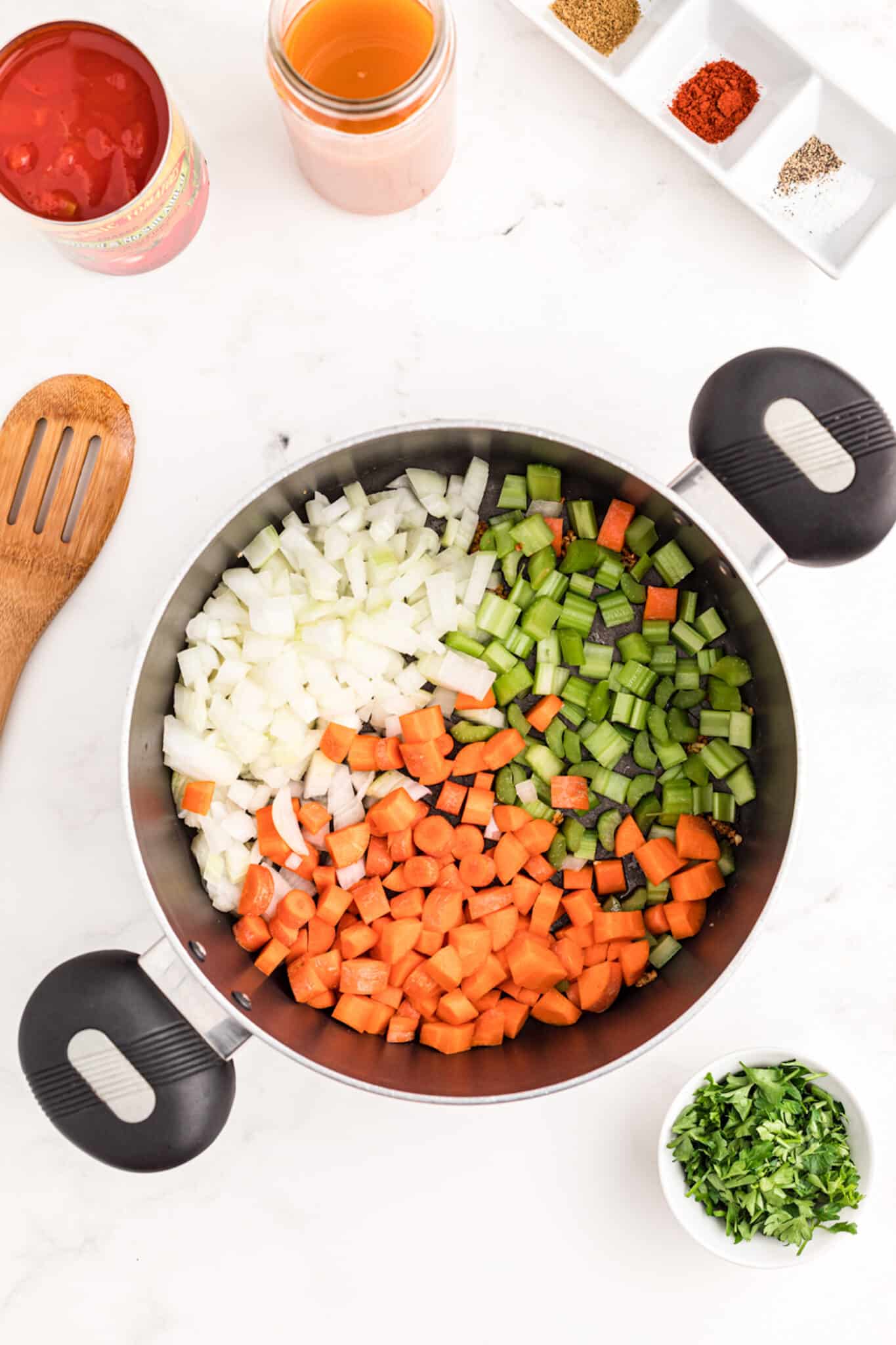 veggies in a pan for turkey lentil soup recipe.