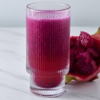 glass of pink dragon fruit juice.